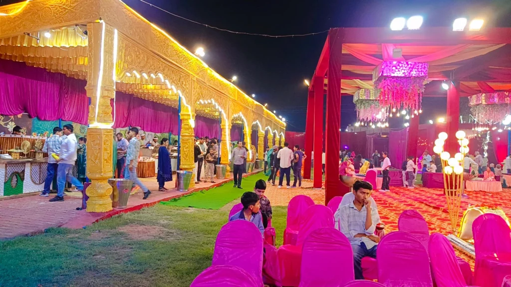 “Outdoor wedding seating and walkway decoration at Prem Garden Bhiwani with lighting and guest arrangement Haryana”